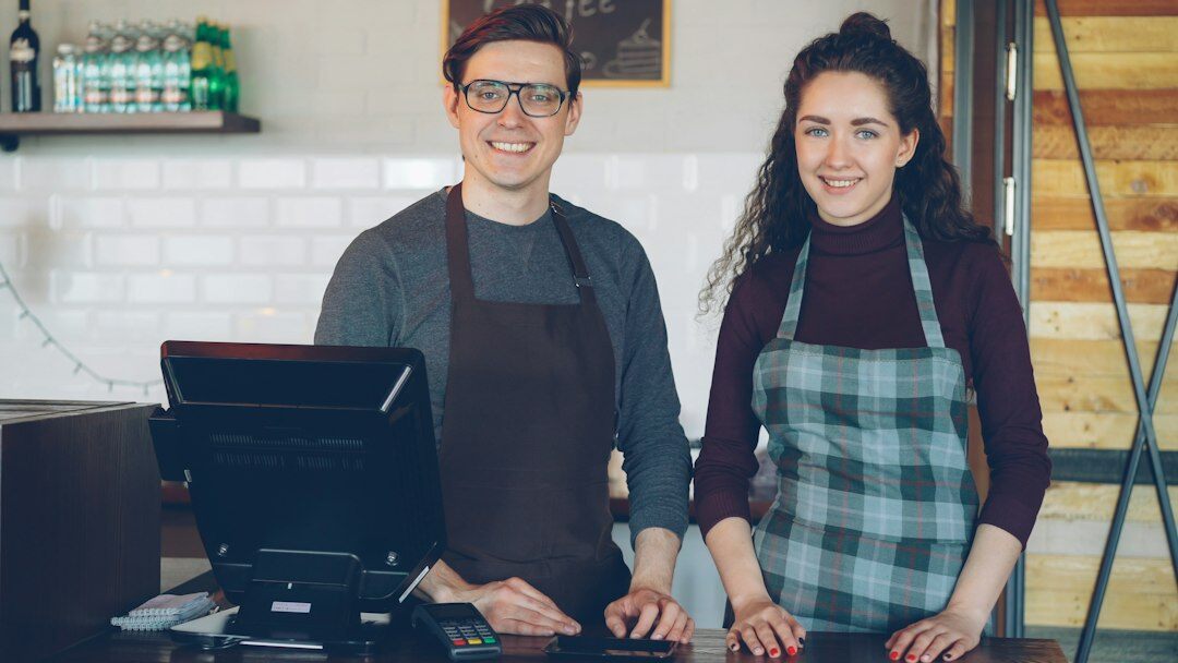 Portrait of a satisfied female client and small business owner