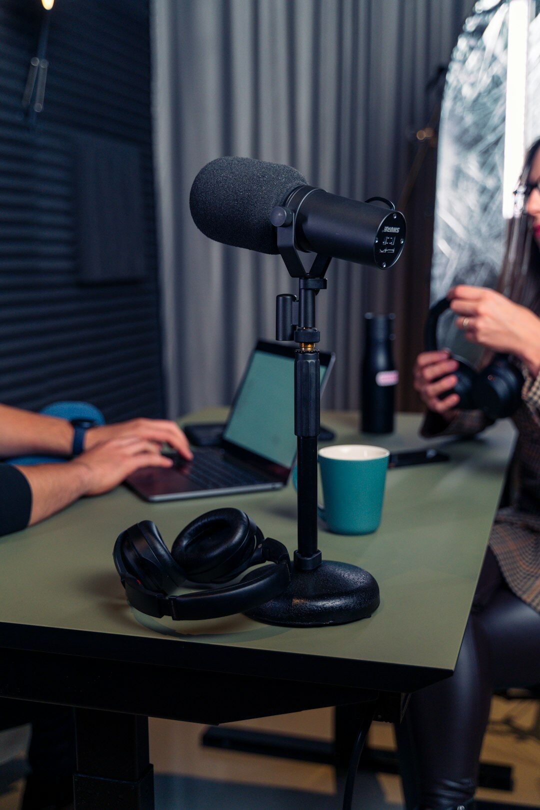 person recording podcast in studio